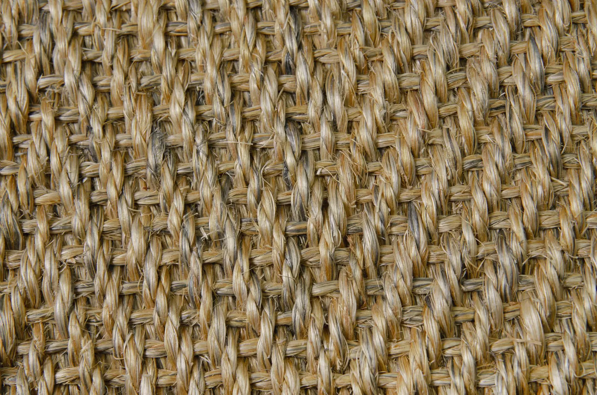 Close-up of a herringbone weave sisal carpet.